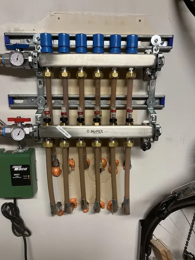 Plumber performing Water Heater Repair at a residential property in West Hartford